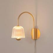 Nuura LED-vegglampe Asteea, bredde 16 cm, messingfarget/klar