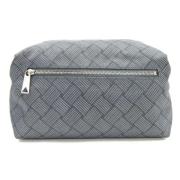 Pre-owned Fabric clutches