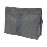 Pre-owned Fabric clutches