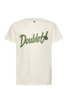 Ola Kids Script & Badge T-Shirt Tops T-shirts Short-sleeved Cream Doub...